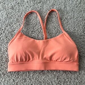 Lululemon flow Y bra in coral kiss - size 4